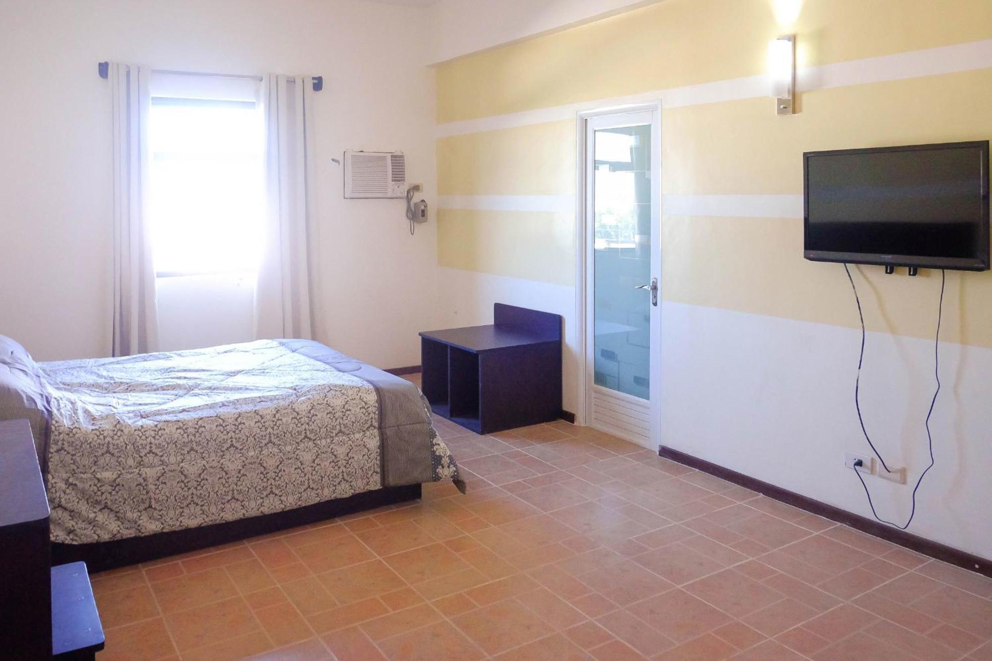 Metro Park Hotel Mandaue Cebu Szoba fotó
